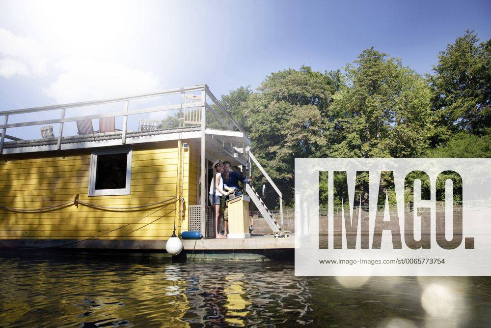 Couple having a trip on a house boat model released Symbolfoto property released FMKF001978