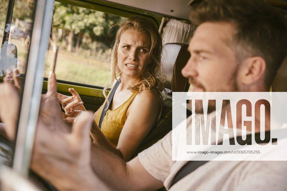 Couple arguing in van on a road trip model released Symbolfoto property released MFF002050