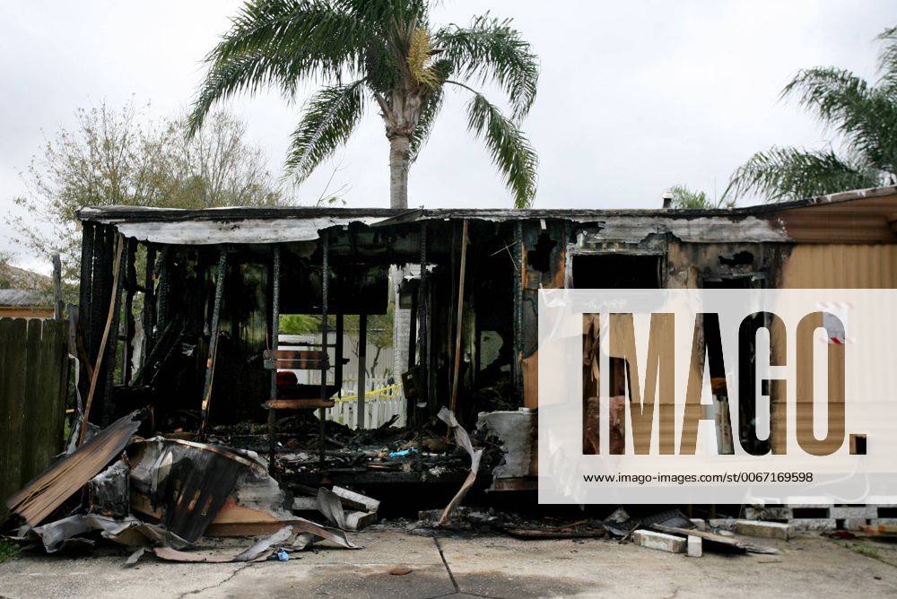 Palm Harbor, Florida, U.S. - DOUGLAS R. CLIFFORD.Residents of the Frontier Village Mobile Home Park in Palm Harbor say this mobile home burned last Saturday at the park, nearly a week before two more mobile homes were discovered on fire earlier this morning (Friday (3 7 14). Deputies responded to the call at 2:30 a.m. at the park, 30700 US Hwy 19 lot 103, and found a mobile home engulfed in flames. A neighbor helped evacuate the two residents inside, Animal Kidd, 65, and Marcus DeVoto, 63, who were both treated for smoke inhalation, according to deputies. While Palm Harbor Fire Rescue was extinguishing the fire at lot 103, another smaller fire was discovered at lot 80 and was quickly extinguished. The lot was vacant and no injuries were reported. - ZUMAs70
