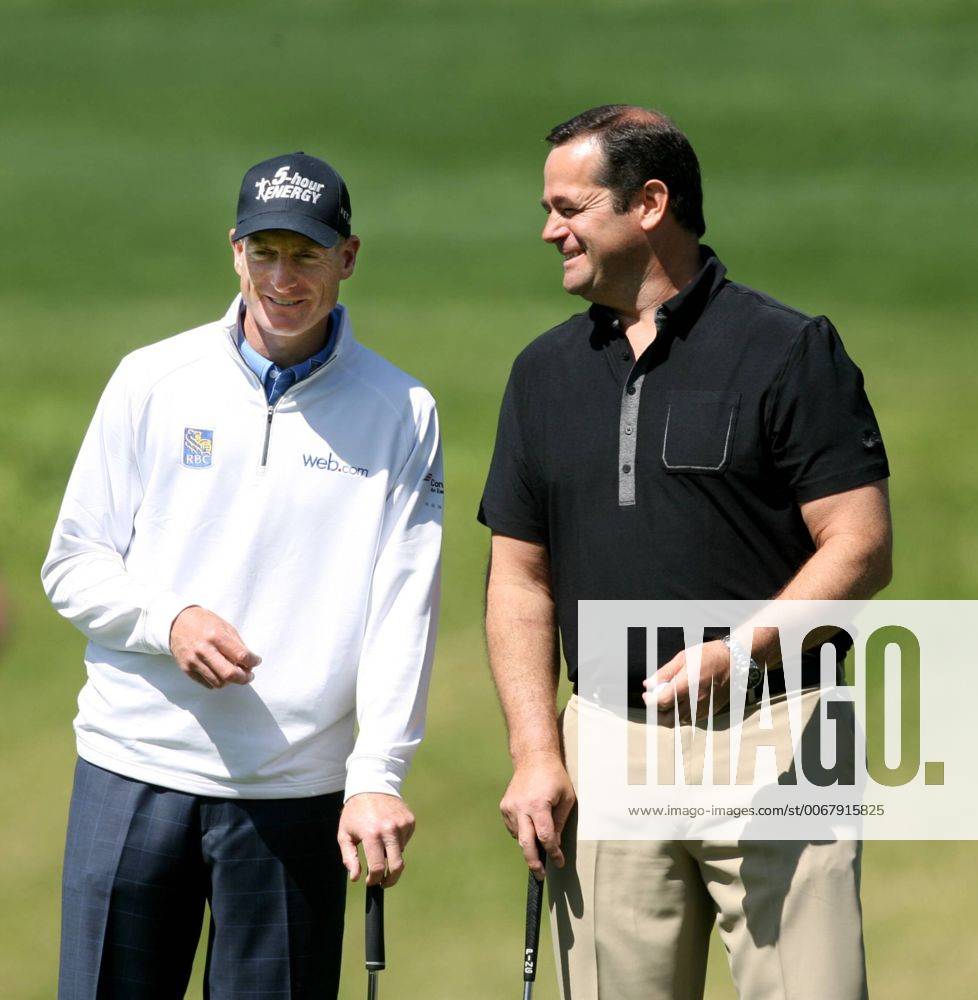 Palm Harbor, Florida, U.S. - DOUGLAS R. CLIFFORD TIMES.Jim Furyk visits with amateur Steve Fischer at the 15th green Wednesday (3 13 13) while competing in the Tampa Bay Championship Pro-Am at Innisbrook s Copperhead Golf Course in Palm Harbor. - ZUMAs70