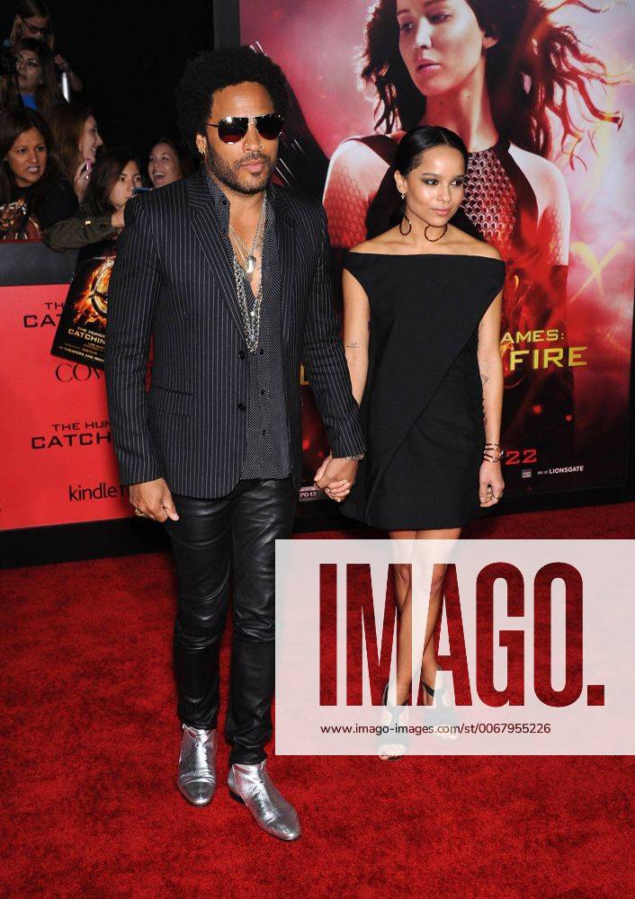 Nov. 18, 2013 - Los Angeles, California, U.S. - Lenny Kravitz & Zoe Kravitz arrives for the premiere of the film The Hunger Games: Catching Fire at the Nokia theater. - ZUMAo05