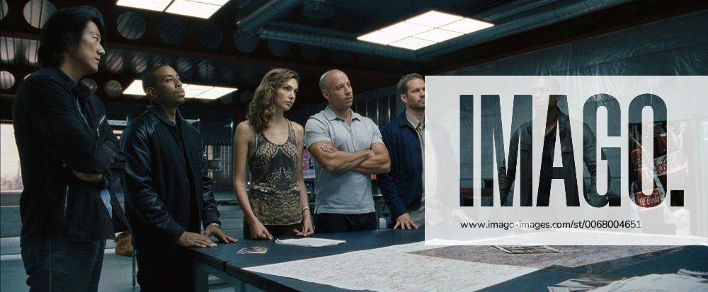 RELEASE DATE: TITLE: Furious 6 aka Fast & Furious 6 STUDIO: Universal Pictures DIRECTOR: Justin Lin PLOT: Hobbs has Dom and Brian reassemble their crew in order to take down a mastermind who commands an organization of mercenary drivers across 12 countries. Payment? Full pardons for them all. PICTURED: Vin Diesel, Paul Walker, Dwayne Johnson ( - ZUMAg90