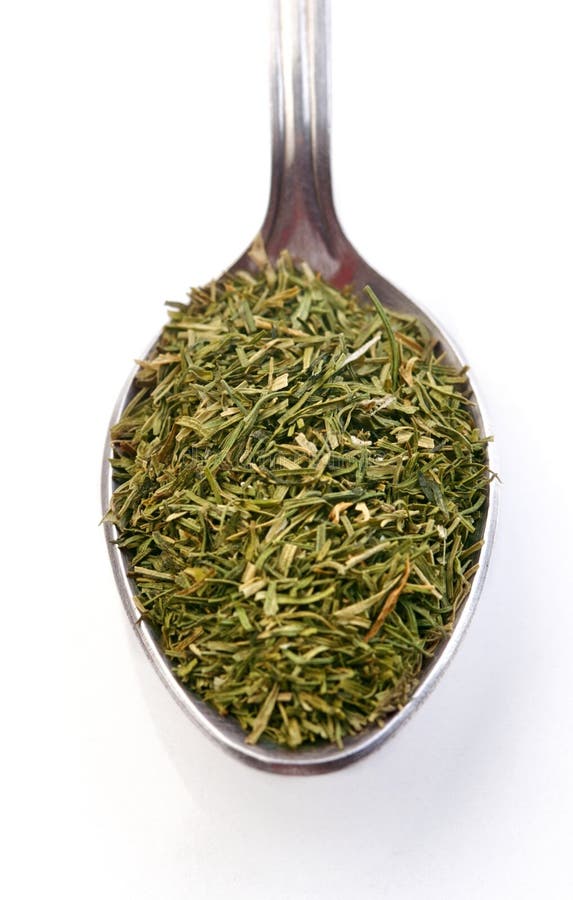 Dried rosemary on spoon - studio shot, Dried rosemary on spoon - studio shot