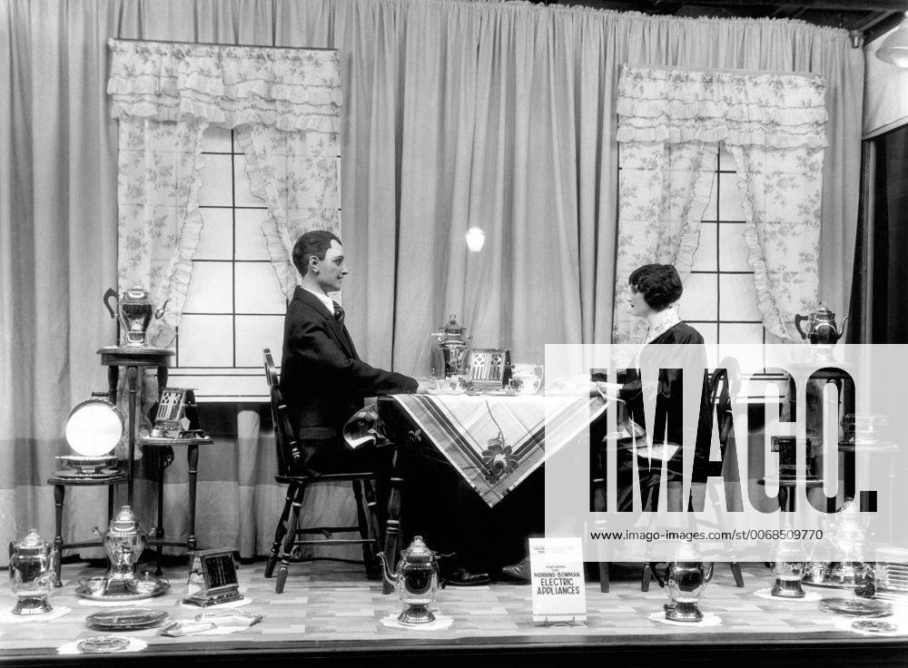 Redding, California: c. 1925. A window display by George Hauber at the McCormick-Saeltzer department store of a couple at the breakfast table surrounded by Manning-Bowman electric appliances. xUnderwoodxArchives 1-Store-D-App_6