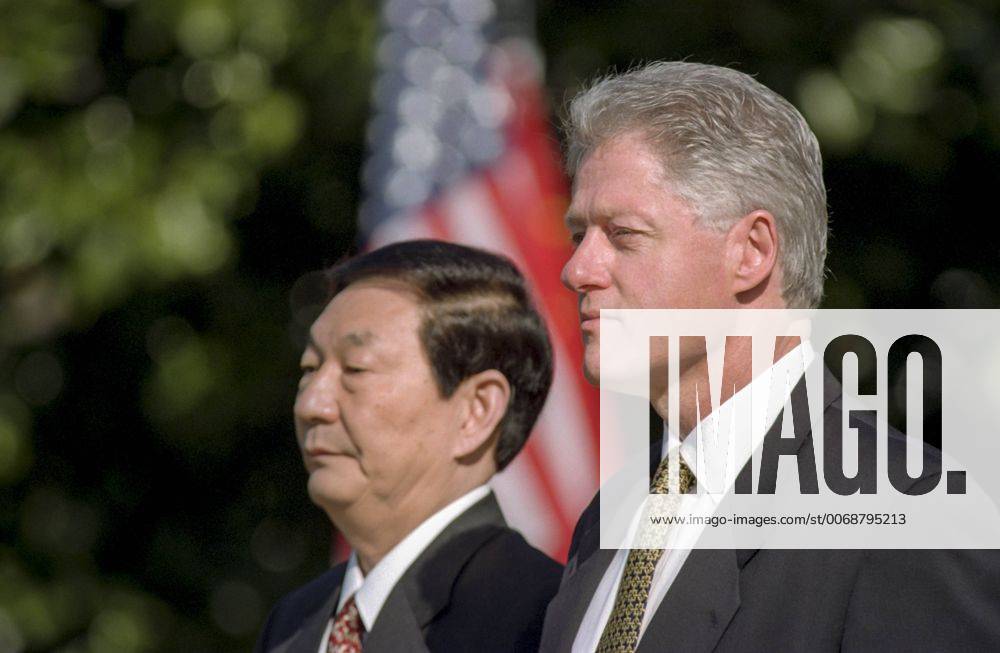 Oct. 20, 2012 - US President Bill Clinton and Chinese Premier Zhu Rongji stand at attention during a state arrival ceremony at the White House April 8, 1999 in Washington, DC. - ZUMAe02_