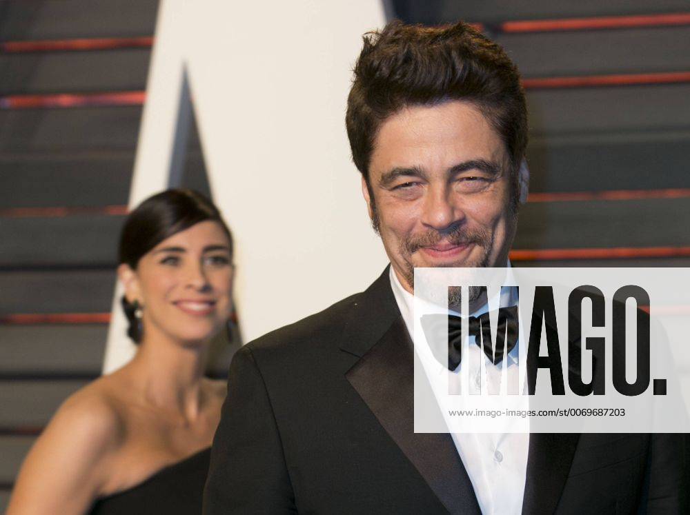 Beverly Hills, California, U.S - Benicio Del Toro with Sarah Silverman on the background on the red carpet at the 2016 Vanity Fair Oscar Party held at the Annenberg Center in Beverly Hills, California, Sunday February 28, 2016. Beverly Hills U.S. - ZUMAp124