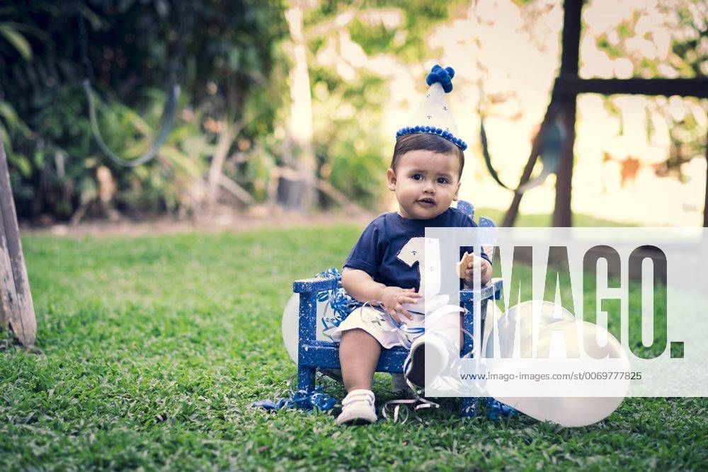 Celebrating baby boy s first birthday model released Symbolfoto ABAF001973