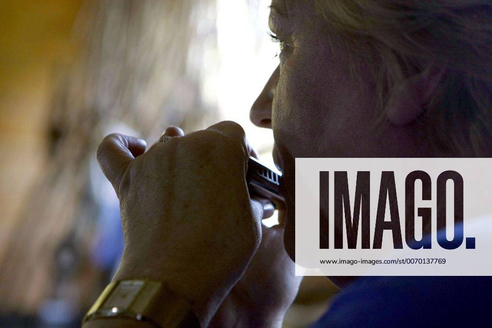 Sep. 30, 2011 - Clarksdale, Mississippi, U.S. - KATE WAKELING, 56, has travelled three times in a year from Australia to attend Blues Harmonica Jam Camp in Clarksdale, Mississippi. I am obsessed she said while trying to gently coax bended notes out of her C harp. - ZUMAf103