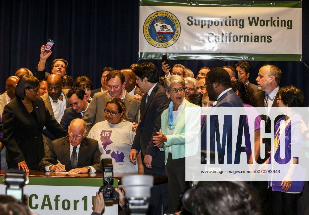 Los Angeles, California, U.S - Governor Jerry Brown joins supporters from across the state in Los Angeles on Monday April 4, 2016, to sign landmark legislation passed by both houses of the Legislature last week SB 3. The SB 3 makes California the first state in the nation to commit to raising the minimum wage to $15 per hour statewide. Under the plan, minimum wage will rise to $10.50 per hour on January 1, 2017 for businesses with 26 or more employees, and then rises each year until reaching $15 per hour in 2022. This plan also recognizes the contributions of small businesses those with 25 or fewer employees to California s economy and allows additional time for these employers to phase in the increases. Los Angeles U.S. - ZUMAc68_