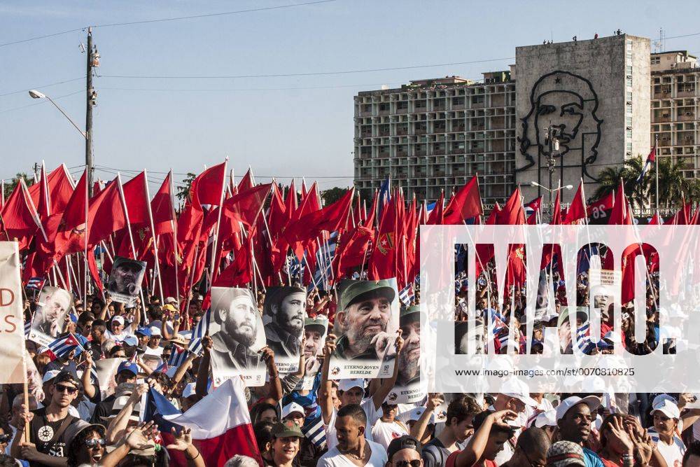 (160501) -- HAVANA, May 1, 2016 -- Cubans and foreign guests parade in Revolutionary Square in Havana, Cuba, on May 1, 2016. More the 500, 000 locals and foreigners took part in Cuba s International Workers Day parade here on Sunday, also celebrating the 90th birthday of Cuban revolutionary leader Fidel Castro. ) (jp) CUBA-HAVANA-MAY DAY-PARADE JOAQUINxHERNANDEZ