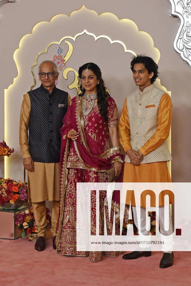 Wedding red carpet of Anant Ambani & Radhika Merchant in Mumbai, India - 12 Jul 2024 Bollywood actress Juhi Chawla (C) pose for a photo with her husband Jay Mehta (L) and son Arjun Mehta (R) on the red carpet wedding ceremony of Anant Ambani and Radhika Merchant in Mumbai. Mumbai India
