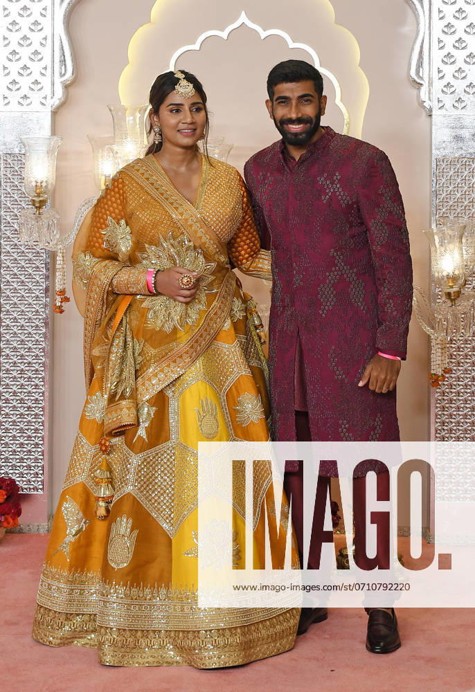 Wedding red carpet of Anant Ambani & Radhika Merchant in Mumbai, India - 12 Jul 2024 Indian cricketer Jasprit Bumrah pose for a photo with his wife and journalist Sanjana Ganesan on the red carpet wedding ceremony of Anant Ambani and Radhika Merchant in Mumbai. Mumbai India