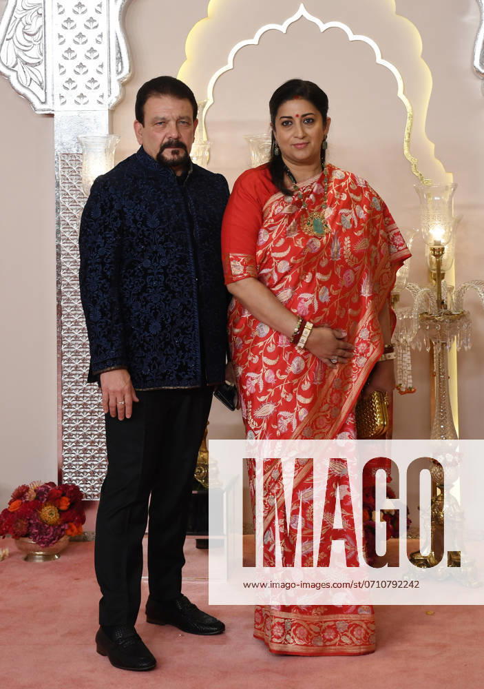 Wedding red carpet of Anant Ambani & Radhika Merchant in Mumbai, India - 12 Jul 2024 Former Member of Rajya Sabha, Smriti Irani pose for a photo with her husband Zubin Irani (L) on the red carpet wedding ceremony of Anant Ambani and Radhika Merchant in Mumbai. Mumbai India