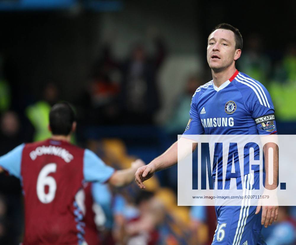 Chelseas John Terry looks on dejected after conceding late on - Barclays Premier League, FC Chelsea (blue) vs. Aston Villa (red) in London 2nd January, 2011 .