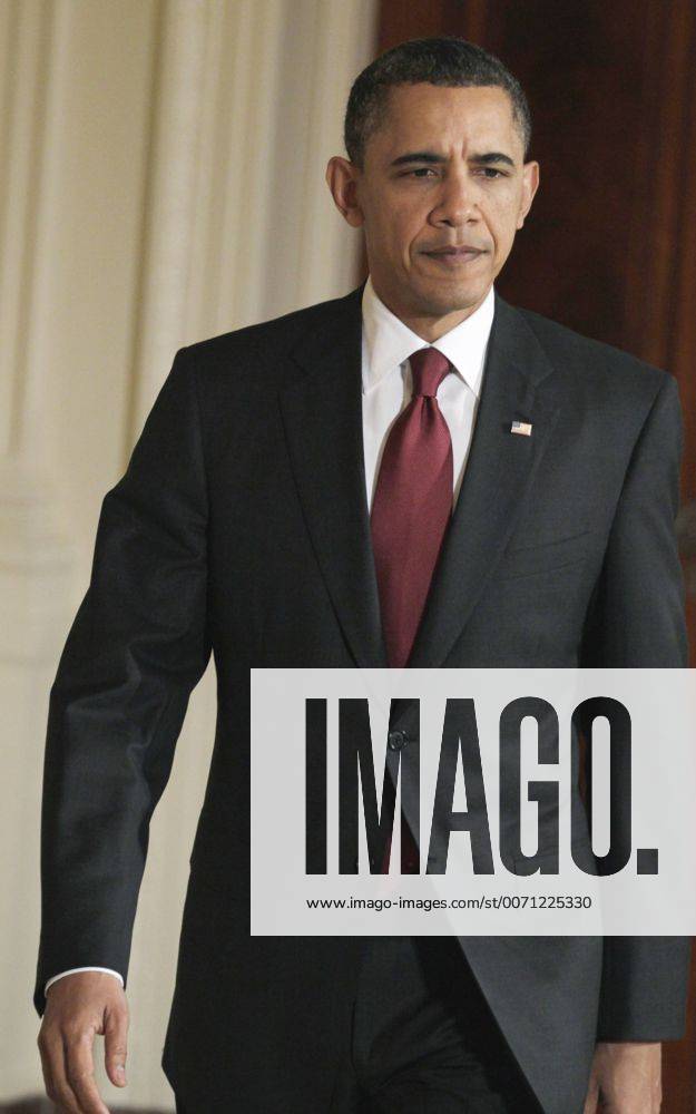 Mar. 18, 2011 - Washington, DC, USA - President Barack Obama arrives to speak about the situation in Libya, Friday, March 18, 2011, in the East Room of the White House in Washington. - ZUMAm42_