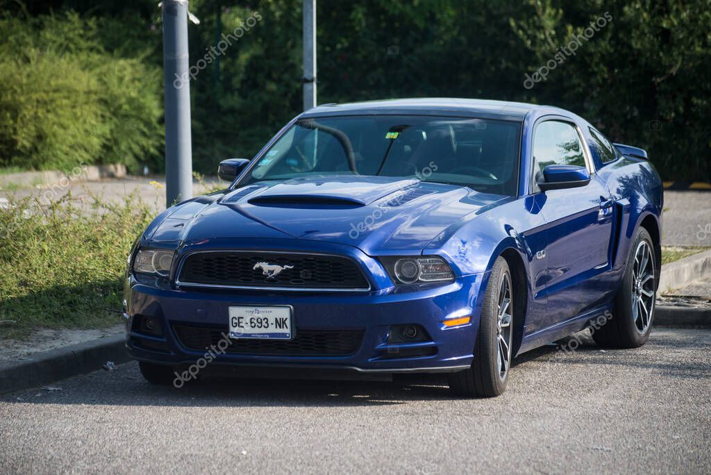 Mulhouse - France - 10 November 2022 - Front view of blue Ford Mustang 500 GT parked in the street