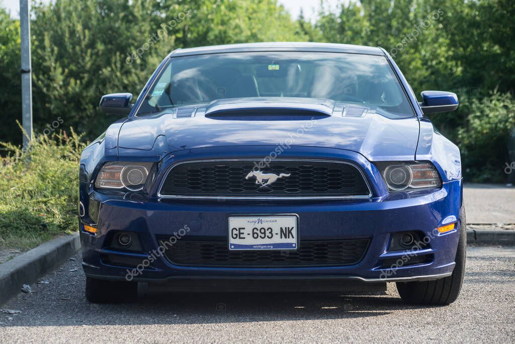 Mulhouse - France - 10 November 2022 - Front view of blue Ford Mustang 500 GT parked in the street