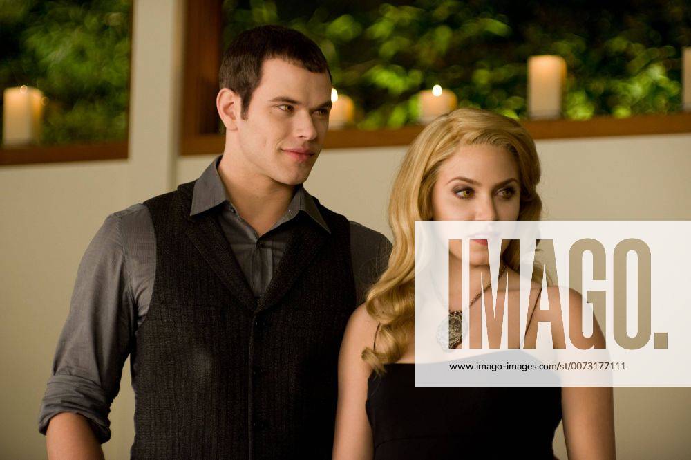 RELEASE DATE: November 20, 2009. MOVIE TITLE: Twilight: New Moon. STUDIO: Imprint Entertainment. PLOT: After Bella recovers from the vampire attack that almost claimed her life, she looks to celebrate her birthday with Edward and his family. However, a minor accident during the festivities results in Bella s blood being shed, a sight that proves too intense for the Cullens, who decide to leave the town of Forks, Washington for Bella and Edward s sake. Initially heartbroken, Bella finds a form of comfort in reckless living, as well as an even-closer friendship with Jacob Black. Danger in different forms awaits. PICTURED: KELLAN LUTZ as Emmett Cullen and NIKKI REED as Rosalie Hale. - ZUMAg90_