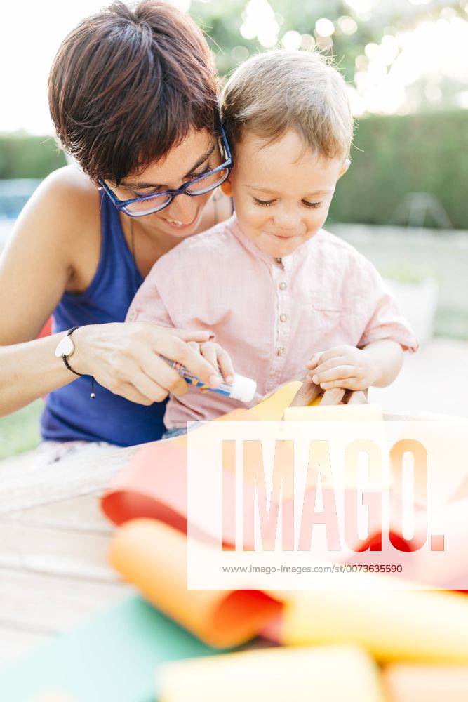 Mother and son doing handicrafts together model released Symbolfoto property released JRFF000846