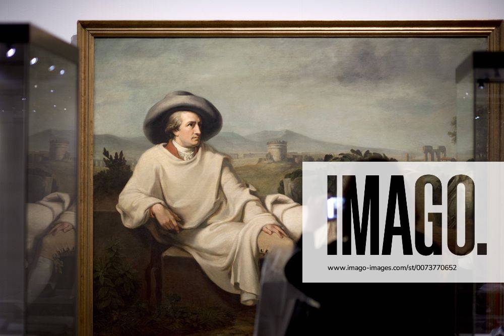 The British View Germany - Memories of a Nation, Exhibition Gropius-Bau DEU, Deutschland, Germany, Berlin, 07.10.2016 Besucher betrachtet ein Werk mit Motiv Johann Wolfgang von Goethe, Goethe in der Campagna von Karl Bennert, in der Ausstellung Der Britische Blick Deutschland - Erinnerungen einer Nation, The British View German - Memories of a Nation, im Martin-Gropius-Bau in Berlin. Die Ausstellung eroeffnet am 08. Oktober und geht bis 09. Januar und praesentiert ca 200 Objekte welche einen Bezug zu den letzten 600 Jahre Geschichte in Deutschland haben. Sie zeigt Spuren deutscher Identitaet aus britischer Perspektive. Visitor next to a painting of Johann Wolfgang von Goethe, Goethe in the Campagna by Karl Bennert, on display during his exhibition Der Britische Blick Deutschland - Erinnerungen einer Nation, The British View German - Memories of a Nation, at the Martin Gropius Bau in Berl