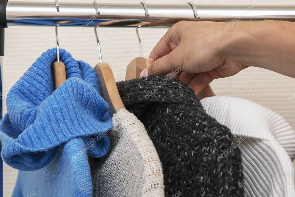Warm clothes hang on a hanger