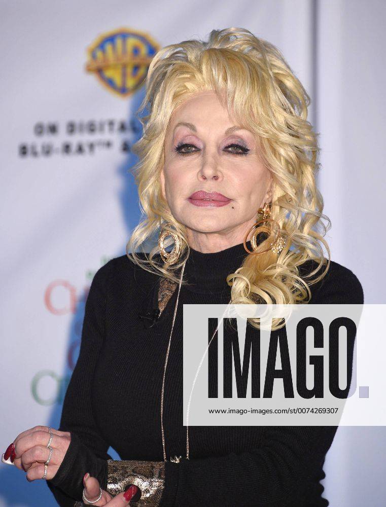 Nashville, TN, United States - 03 November 2016 - Nashville, Tennessee - Dolly Parton. Dolly Parton and Jennifer Nettles Christmas of Many Colors: Circle of Love Press Conference held at Citation Support Facility. Photo Credit: Laura Farr AdMedia Nashville United States - ZUMAa123 20161103_zaa_a123_024