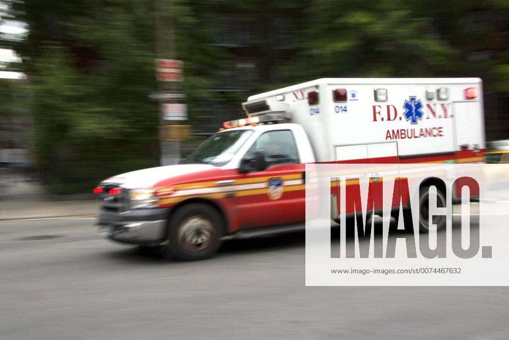 New York Fire Department ambulance in motion in Manhattan, New York City, New York, USA.