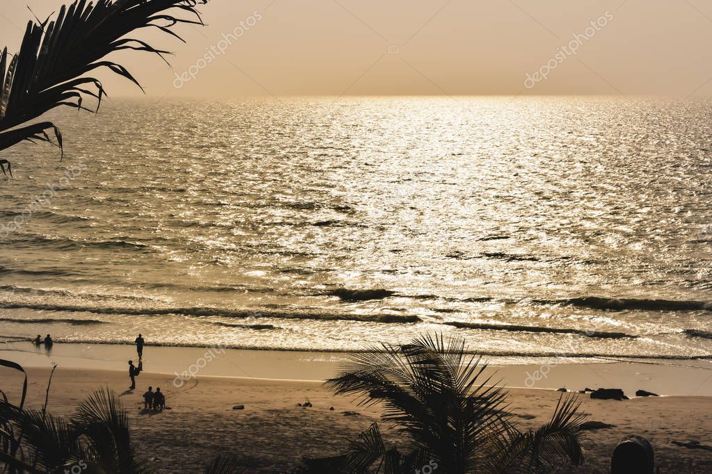 Panorama landscape view of a beautiful tropical sea beach in sunset time during christmas holiday. ( MUMBAI, MAHARASTRA, INDIA). Travel vacation and holiday concept.