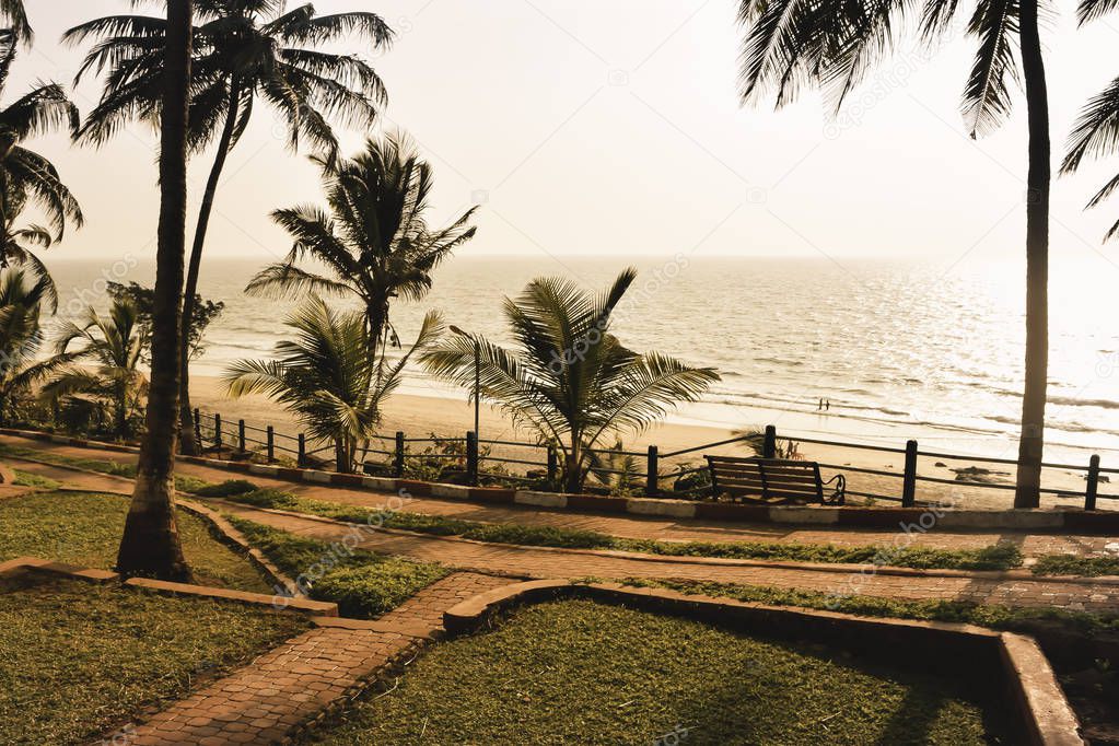 Panorama landscape view of a beautiful tropical sea beach in sunset time during christmas holiday. ( MUMBAI, MAHARASTRA, INDIA). Travel vacation and holiday concept.