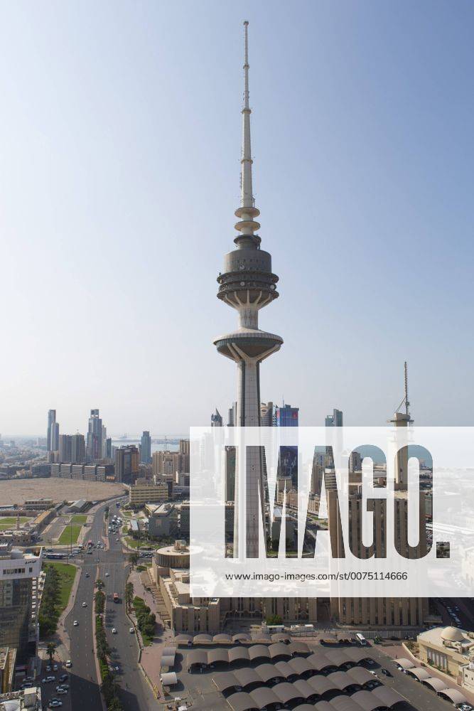 Elevated view of the modern city skyline and central business district with Liberation Tower, Kuwait City, Kuwait, Middle East