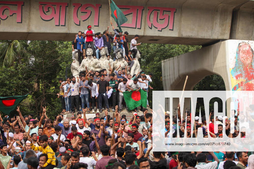 Anti-government Protest in Bangladesh Anti-government protestors celebrate in Dhaka on August 5, 2024. Protests in Bangladesh that began as student-led demonstrations against government hiring rules in July culminated on August 5, in the prime minister fleeing and the military announcing it would form an interim government. Dhaka Dhaka Bangladesh