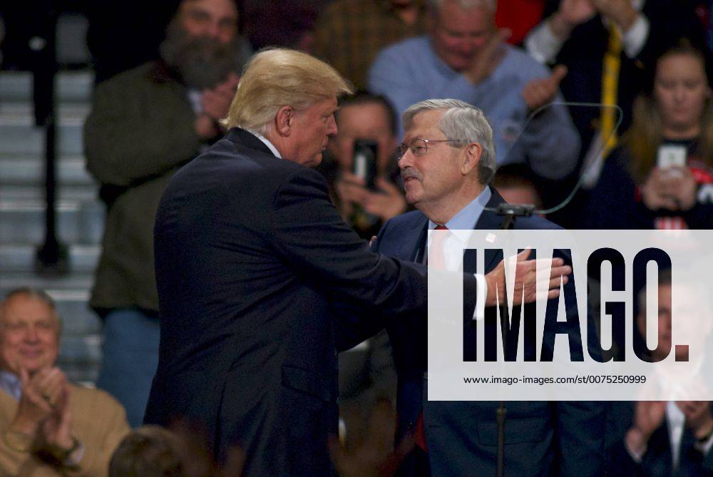 Des Monies, Iowa, U.S - President Elect Donald Trump greets Iowa Governor Terry Branstad in front of the crowd of supporters in HyVee Hall at the Des Monies events center. The second stop on todays tour thanking the voters for his election victory Des Monies U.S. - ZUMAr142 20161208_zap_r142_002