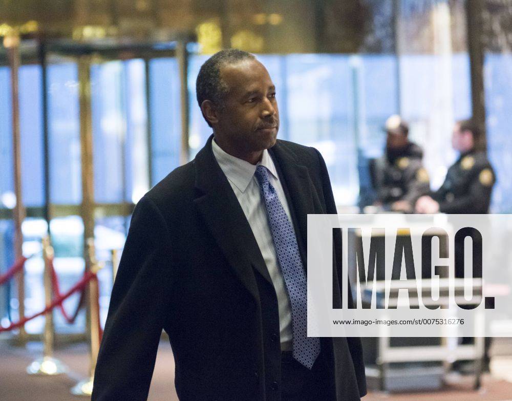 New York, New York, United States of America - Dr. Ben Carson, United States President-elect Donald Trump s nominee for Secretary of Housing and Urban Development (HUD), is seen in the lobby of Trump Tower in New York, NY, USA upon his arrival on December 12, 2016. .Credit: Pool via CNP New York United States of America - ZUMAs152 20161212_zaa_s152_005