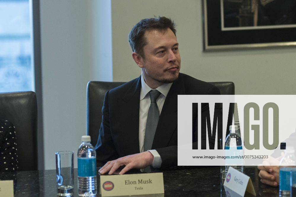 New York, New York, United States of America - Tesla CEO Elon Musk is seen in attendance at a meeting of technology chiefs in the Trump Organization conference room at Trump Tower in New York, NY, USA on December 14, 2016. . New York United States of America - ZUMAs152 20161214_zaa_s152_036
