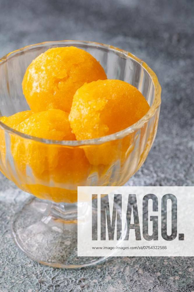 Mango sorbet bowl, Mango sorbet scoop in the glass bowl, Mango sorbet scoop in the glass bowl, 22.05.2024,