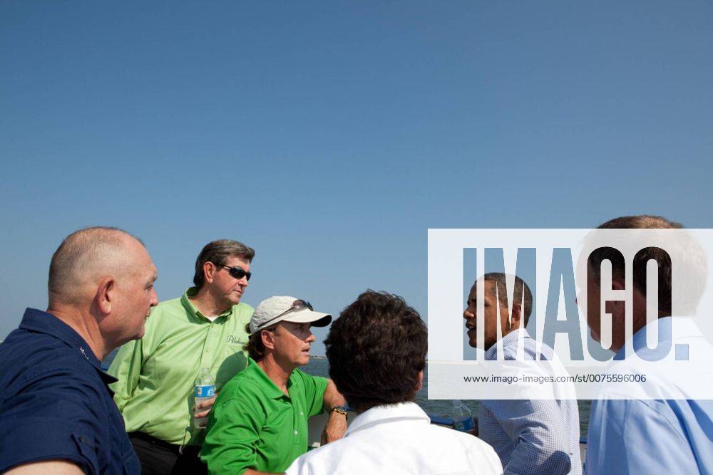 Jul. 21, 2010 - Fort Morgan, AL - President Barack Obama talks with, from left, National Incident Commander Adm. Thad Allen, Alabama Gov. Bob Riley, Gulf Shores Mayor Robert Craft, Senior Advisor Valerie Jarrett, and Dauphin Island Mayor Jeff Collier, as they travel aboard the Dauphin Island Ferry to Fort Morgan, Ala., June 14, 2010. This was the President s fourth trip to the Gulf Coast to assess the ongoing response to the BP oil spill in the Gulf of Mexico. (Official White House Photo by ) ..This official White House photograph is being made available only for publication by news organizations and or for personal use printing by the subject Fort Morgan - ZUMAz03_ 20100721_shh_z03_825