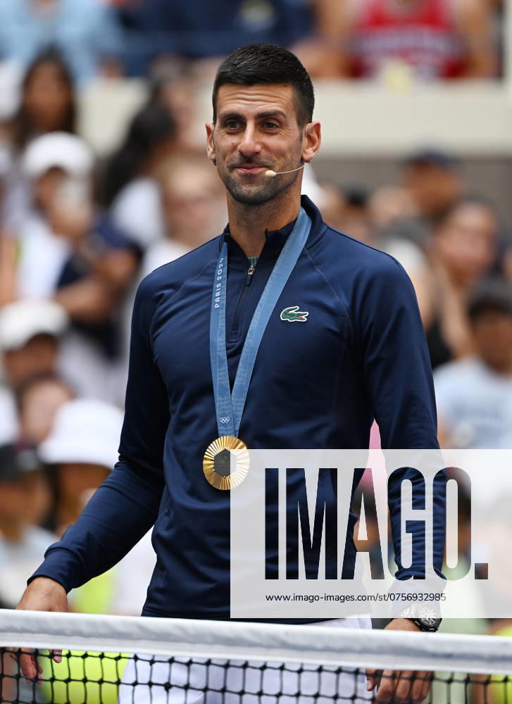 FLUSHING NY- AUGUST 24: Novak Djokovic is seen with his Olympic Gold Medal during Arthur Ashe Kids Day at the USTA Billie Jean King National Tennis Center on August 24, 2024 in Flushing Queens.
