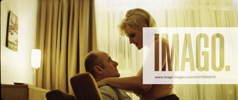RELEASE DATE: February 9, 2007. MOVIE TITLE: Das Leben der Anderen (North America: The Lives of Others ) - STUDIO: Creado Film Sony Pictures Classics. PLOT: Captain Wiesler (Muhe) is a wiretapping expert with the Stasi (East German Secret Police) in the mid-eighties,who becomes disillusioned with his career and life in general in the former socialist republic when his latest assignment, Georg Dreyman (Koch), a playwright with views against the totalitarian state, starts to challenge his beliefs through his overheard conversations. PICTURED: ULRICH MUHE as Hauptmann Gerd Wiesler and a prostitute. - ZUMAg90_ 20070209_ddn_g90_500