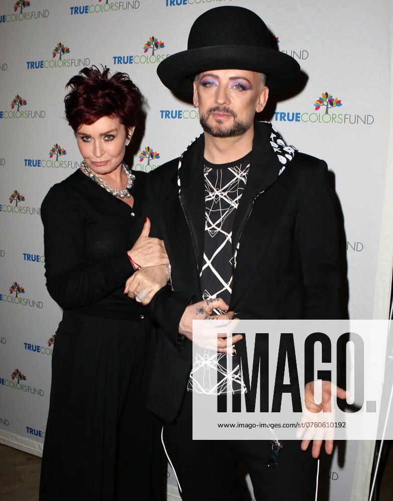 Sharon Osbourne and Boy George attending The 5th Annual Cyndi Lauper And Friends: Home For The Holidays Benefit Concert at the Beacon Theatre on December 5, 2015 in New York City.