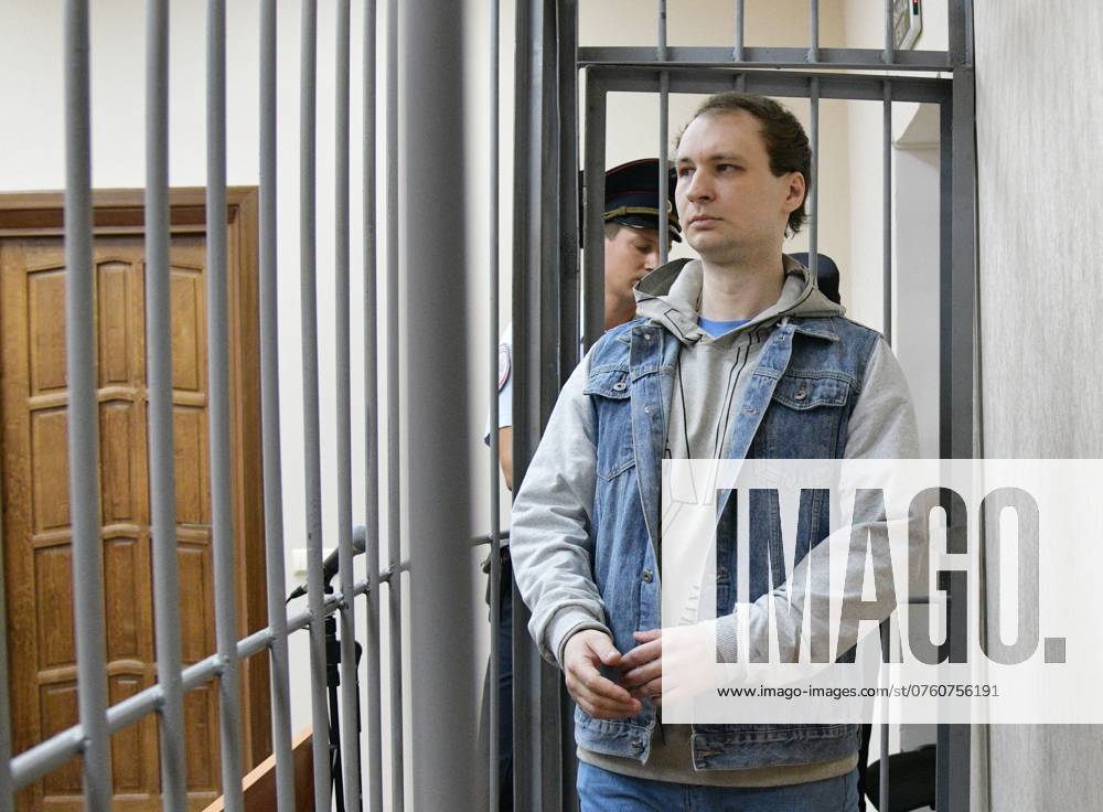 Russia US Ex-Marine Trial 8760711 09.09.2024 Robert Gilman, a 28-year-old former US Marine already serving a prison sentence for attacking a police officer while drunk and now facing new assault charges, is seen inside a defendant s cage during a hearing at Central District Court in Voronezh, Russia. Andrey Arhipov Sputnik Voronezh Russia