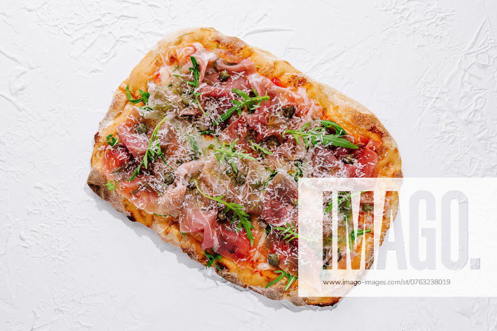 Square pizza with prosciutto and arugula square pizza with prosciutto and arugula