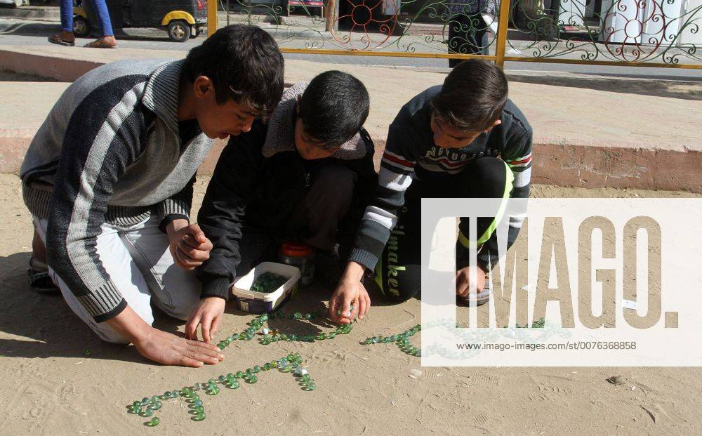 Rafah, Gaza Strip, Palestinian Territory - Palestinian children play marbles in a street in Rafah in the southern Gaza strip on January 19, 2017 Rafah Palestinian Territory - ZUMAap3_ 20170119_zaf_ap3_041