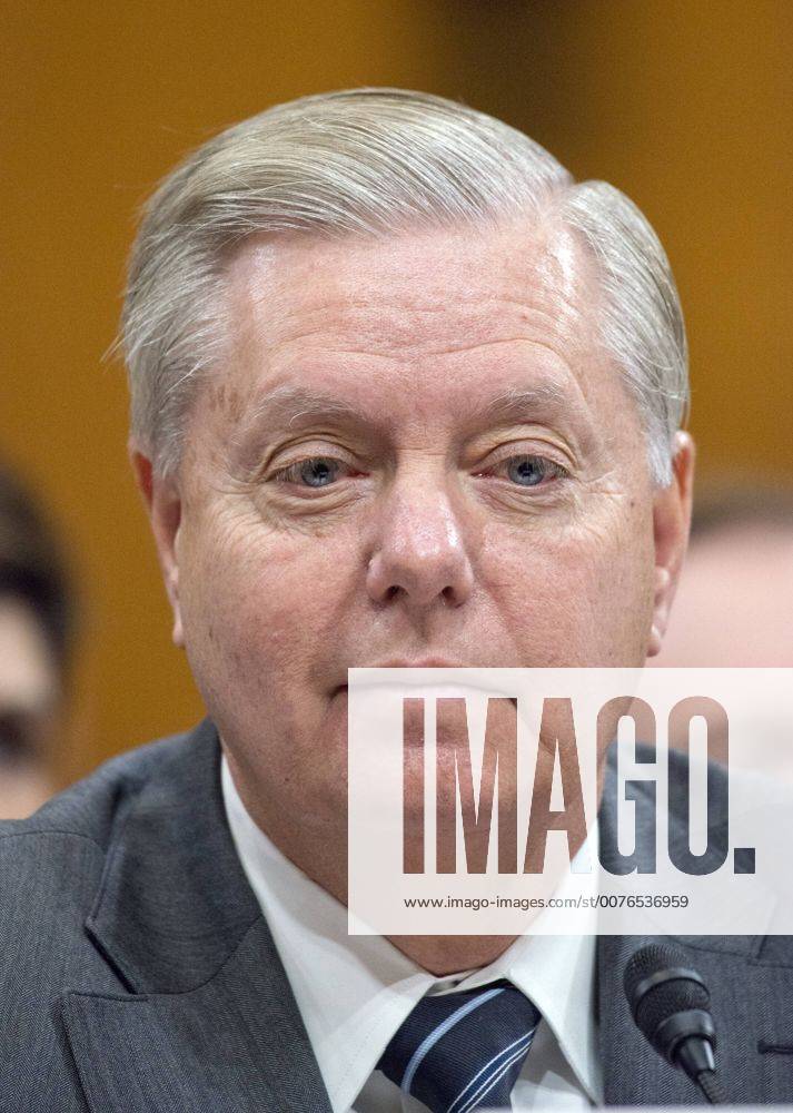 Washington, District of Columbia, United States of America - United States Senator Lindsey Graham (Republican of South Carolina) introduces US Representative Mick Mulvaney (Republican of South Carolina) at the confirmation hearing before the US Senate Committee on the Budget considering Mulvaney s nomination to be Director, White House Office of Management and Budget (OMB) on Capitol Hill in Washington, DC on Tuesday, January 24, 2017..Credit: CNP Washington United States of America - ZUMAs152 20170124_zaa_s152_051