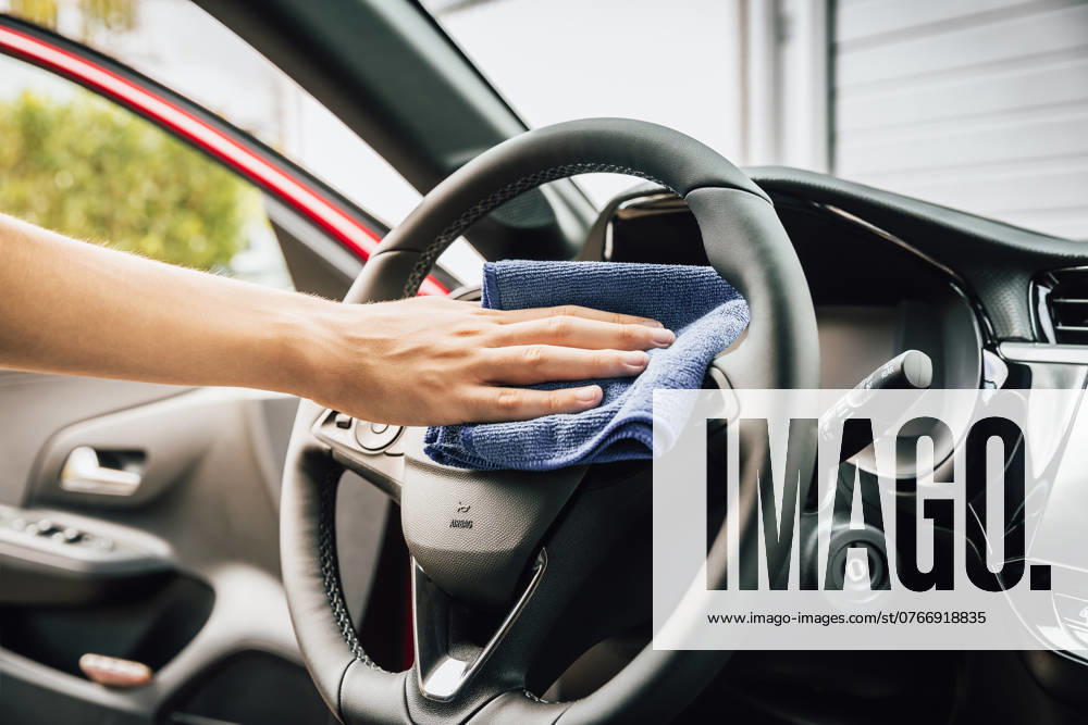 Cleaning and detailing car interior using microfiber towel Cleaning and detailing car interior using microfiber towel