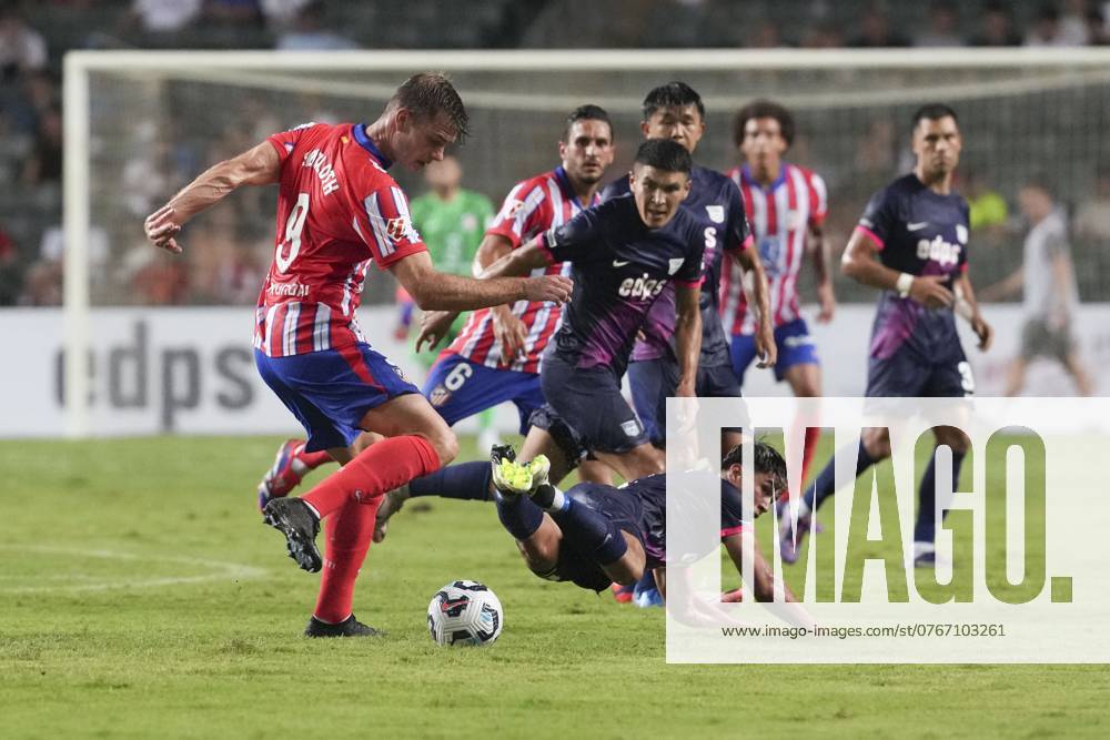 Atletico De Madrid s Alexander Sorloth (L) and Kitchee s Jay Haddow in action during the Boc Life Cup match between Atletico De Madrid and Kitchee at Hong Kong Stadium, Causeway Bay. 07AUG24. SCMP Sam Tsang HONG KONG CHINA