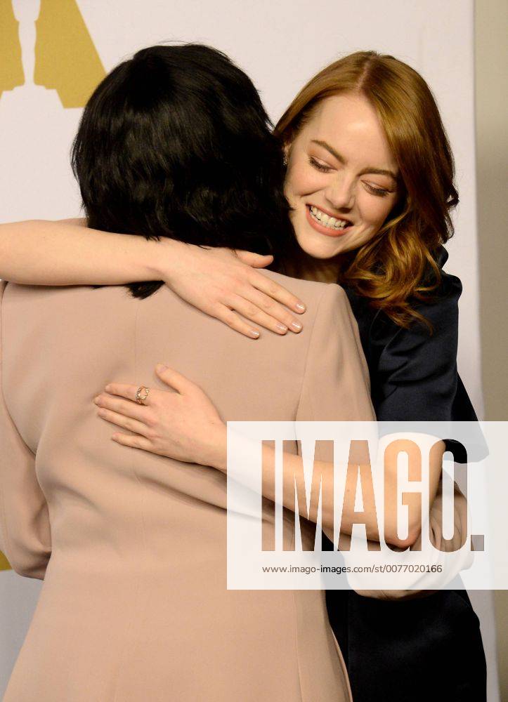 Actress Emma Stone (R) and AMPAS President Cheryl Boone Isaacs attend the 89th annual Academy Awards Oscar nominees luncheon at the Beverly Hilton Hotel in Beverly Hills, California on February 6, 2017. LAP20170206041 JIMxRUYMEN