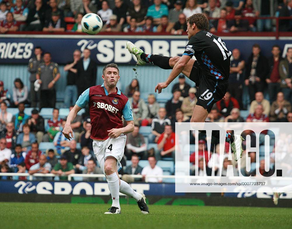 Football - Premier League - West Ham United vs. Aston Villa Danny Gabbidon Of West Ham and Stiliyan of Aston Villa at Upton Park, London