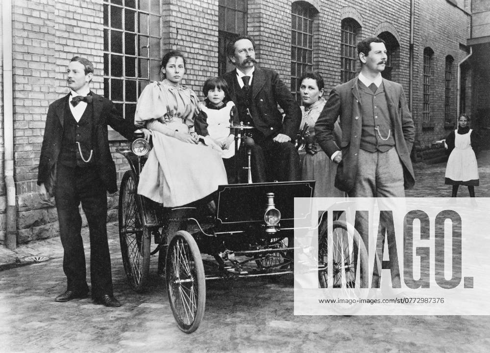 Carl Benz with his family at his Benz Velo in the Mannheim factory yard, 1894. Private Collection.