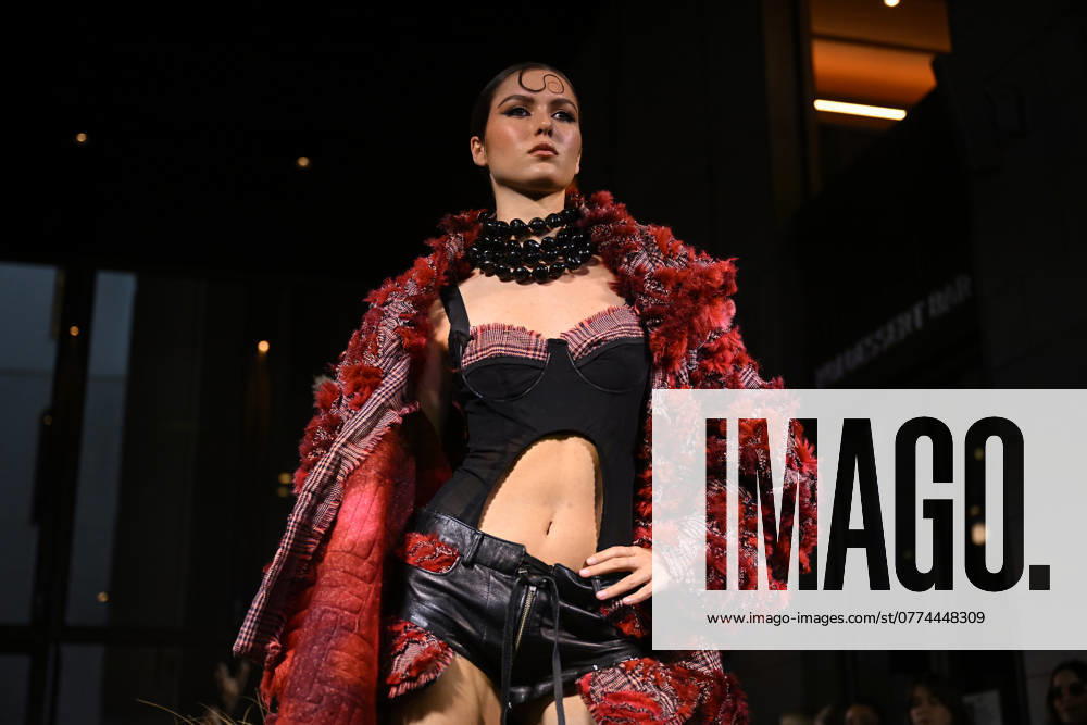 MELBOURNE FASHION WEEK PREVIEW, A model walks the runway during a Melbourne Fashion Week media preview in Melbourne, Monday, October 21, 2024. ( NO ARCHIVING, , NO USE IN BOOKS WITHOUT CONSENT Melbourne Victoria Australia
