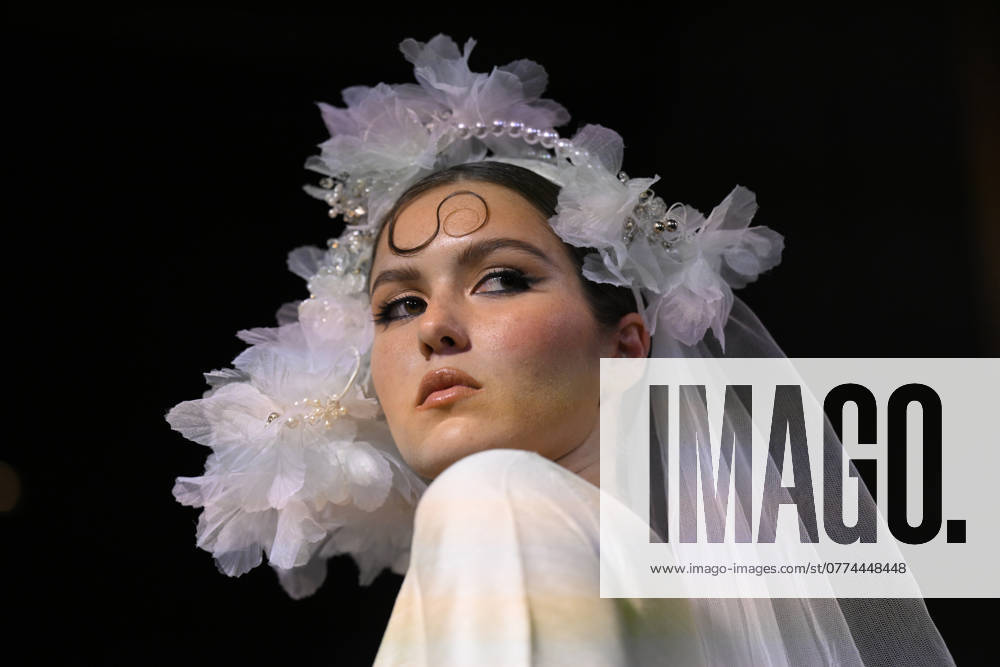 MELBOURNE FASHION WEEK PREVIEW, A model walks the runway wearing a design by Wa Ring during a Melbourne Fashion Week media preview in Melbourne, Monday, October 21, 2024. ( NO ARCHIVING, , NO USE IN BOOKS WITHOUT CONSENT Melbourne Victoria Australia